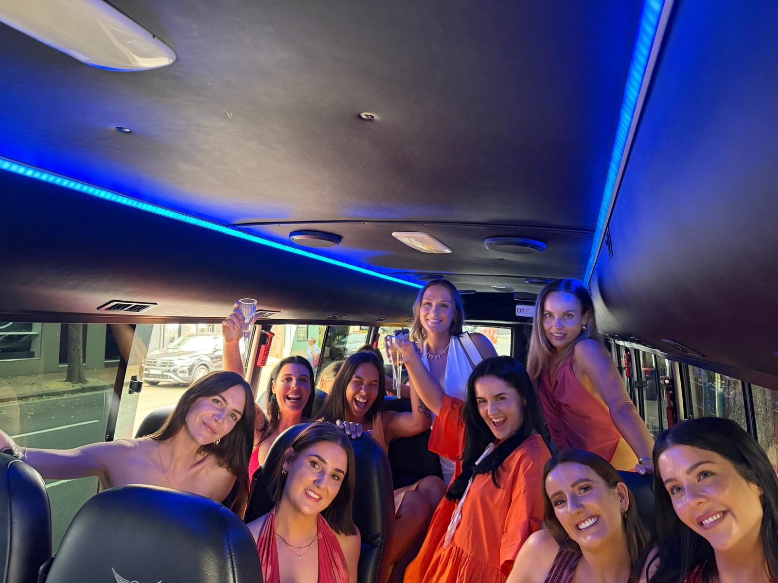 Guests celebrating on the SKS party bus
